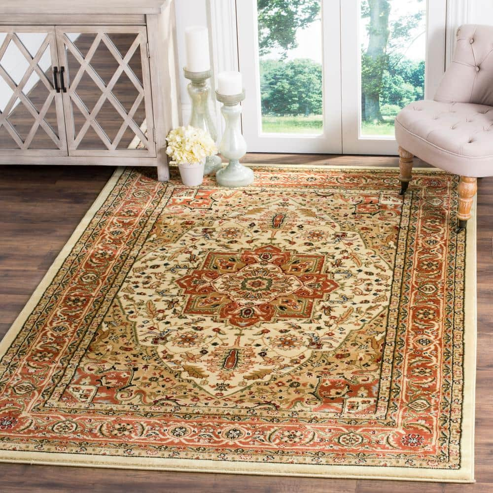 SAFAVIEH Lyndhurst Miranda Traditional Bordered Area Rug, Ivory/Rust, 7'9" x 9'9"
