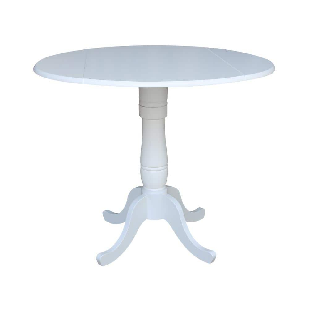 International Concepts 42 In Round dual drop Leaf Pedestal Table - 35.5  inchesH
