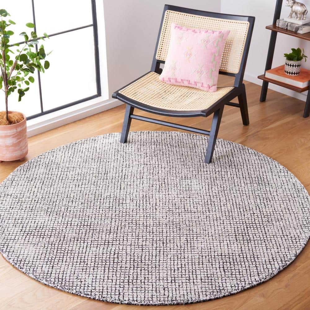 SAFAVIEH Abstract Dalia Geometric Area Rug, Ivory/Black, 4' x 4' Round