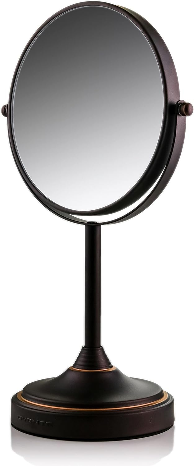 OVENTE 7'' Tabletop Makeup Mirror with 1X/7X Magnification, 360° Swivel Design and Double-Sided Free-Standing Vanity Mirror Perfect for Dresser, Bedroom and Office Desk, Antique Bronze MNLCT70ABZ1X7X