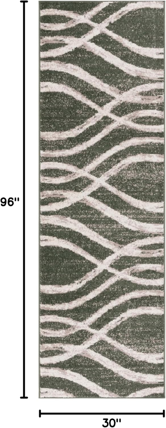 6' x 9' Dark Green and Ivory Synthetic Rectangular Rug