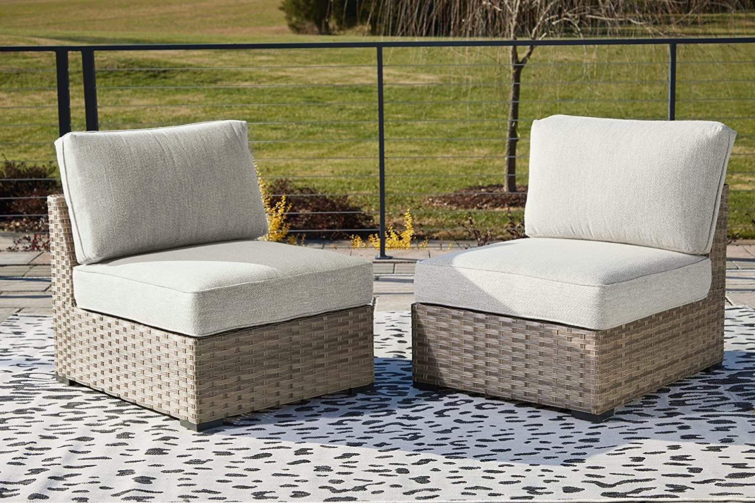 Signature Design by Ashley Contemporary Calworth Outdoor Armless Chair with Cushion (Set of 2)  Beige