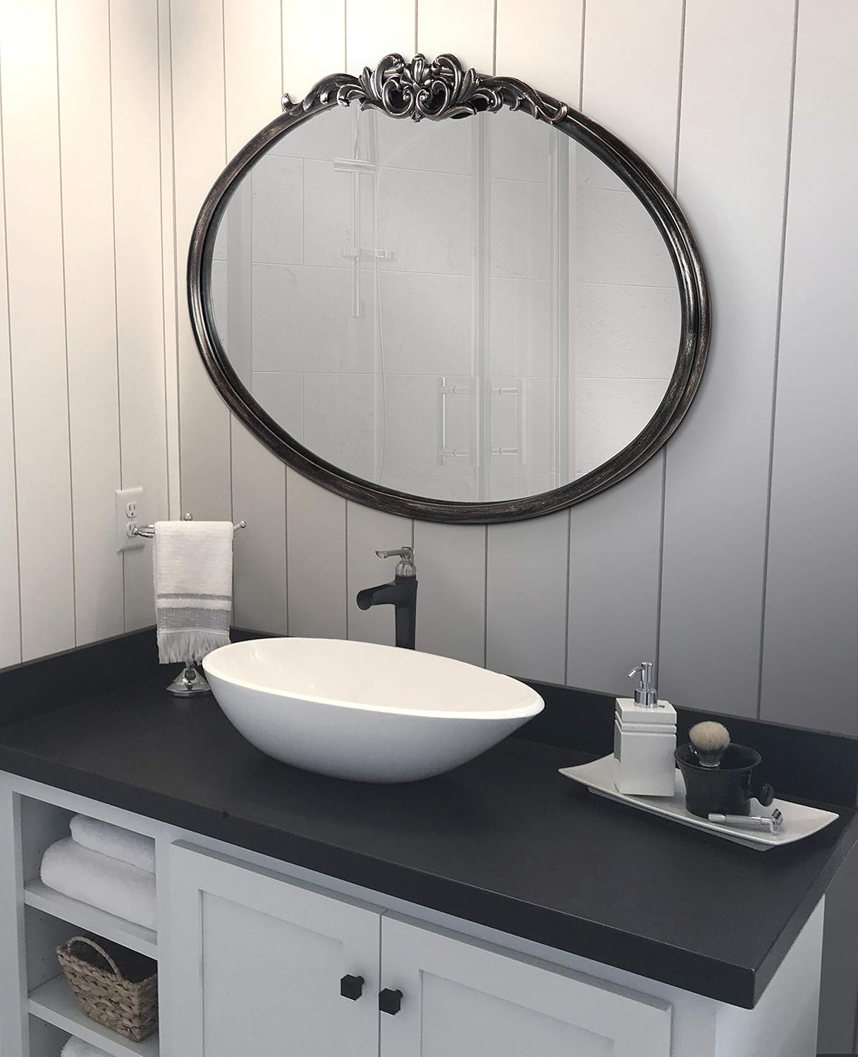 Black Oval Wood Wall Mirror with Intricate Overlay