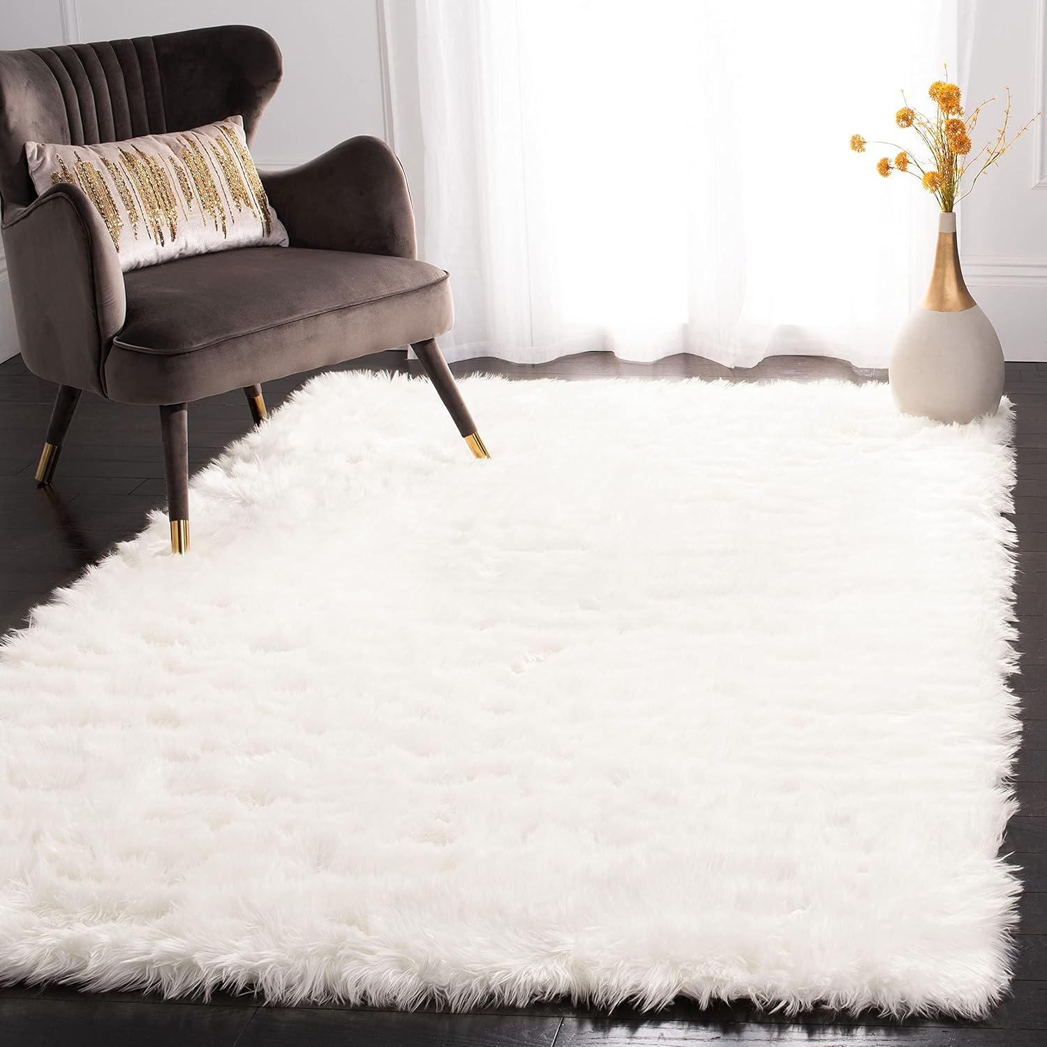SAFAVIEH Faux Sheep Skin Vesna Solid Plush Area Rug, Ivory, 5' x 7'