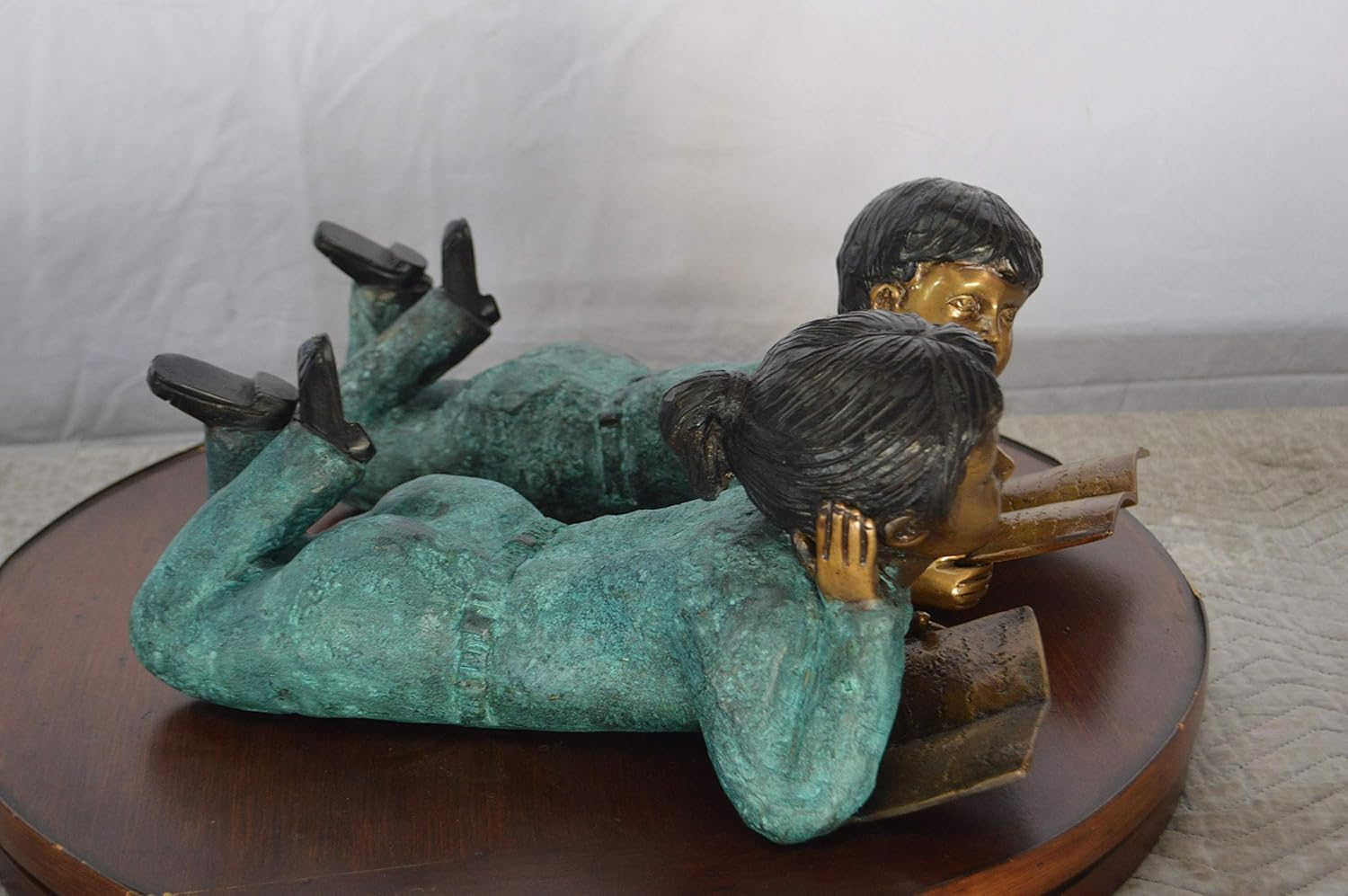 Set of a Boy and a Girl Reading a Book Bronze Statue - Size: 16"L x 7"W x 8"H.
