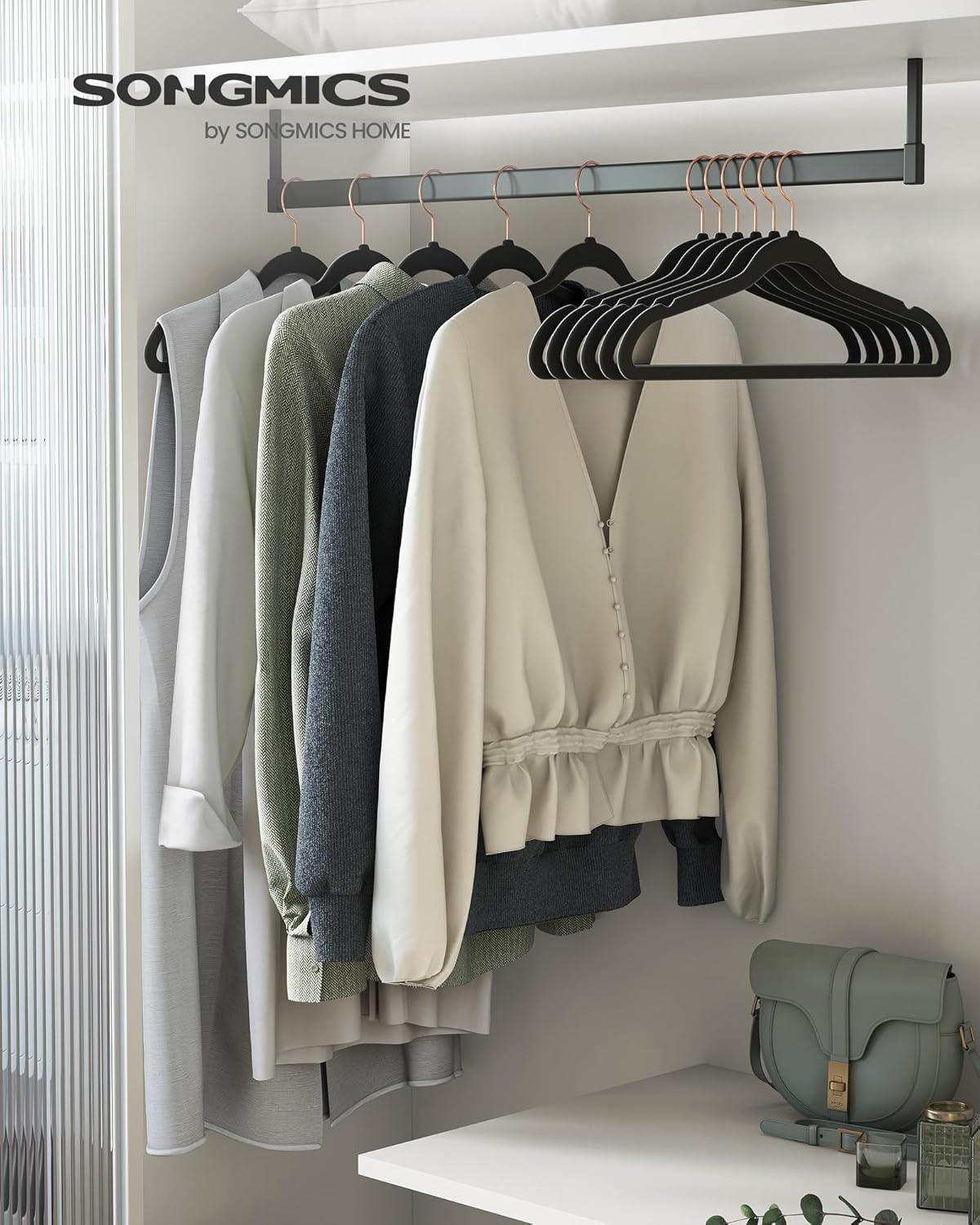 SONGMICS Velvet Hangers 50 Pack, Non-Slip with Rose Gold-Colored Swivel Hooks, Slim Space-Saving for Closet, Heavy-Duty, Black UCRF026B50