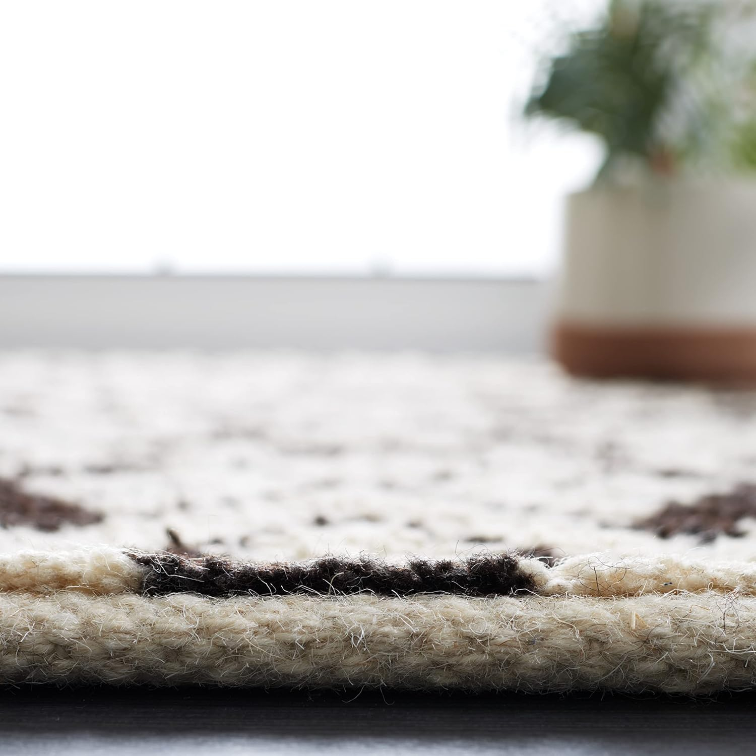 Ivory and Black Hand-Knotted Wool 6' x 9' Area Rug