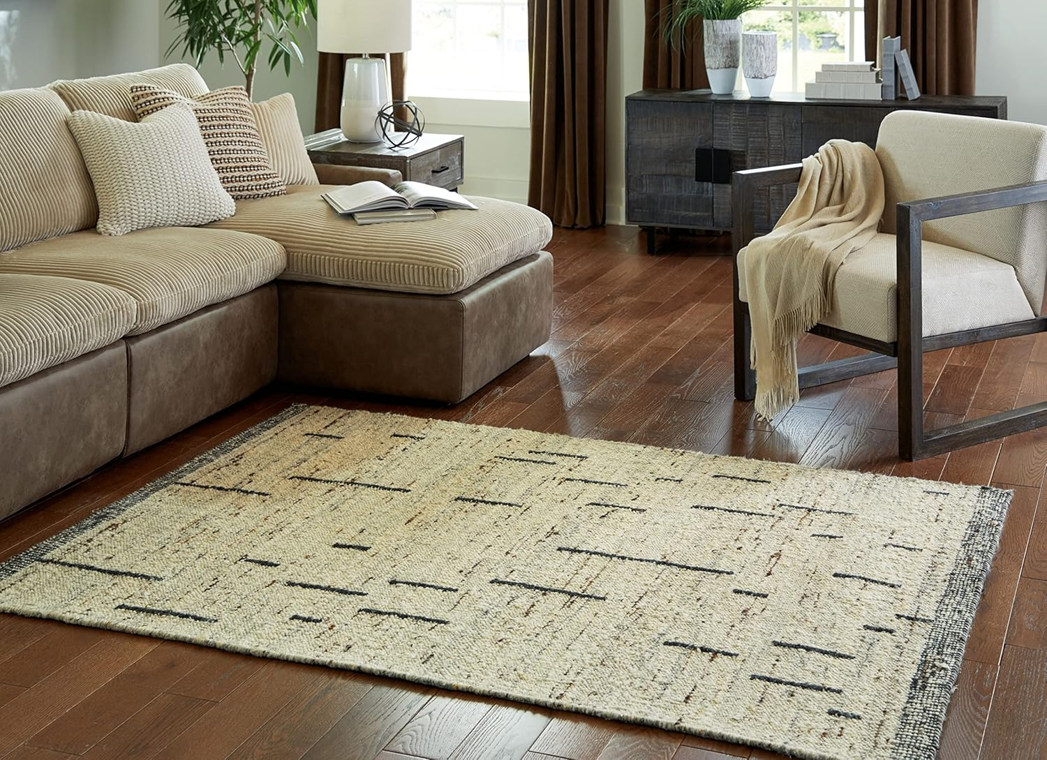 Signature Design by Ashley Mortis Casual 5x7 Area Rug, Light Brown & Black