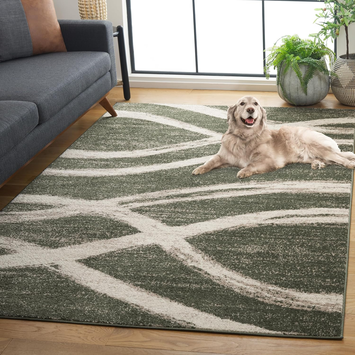 6' x 9' Dark Green and Ivory Synthetic Rectangular Rug