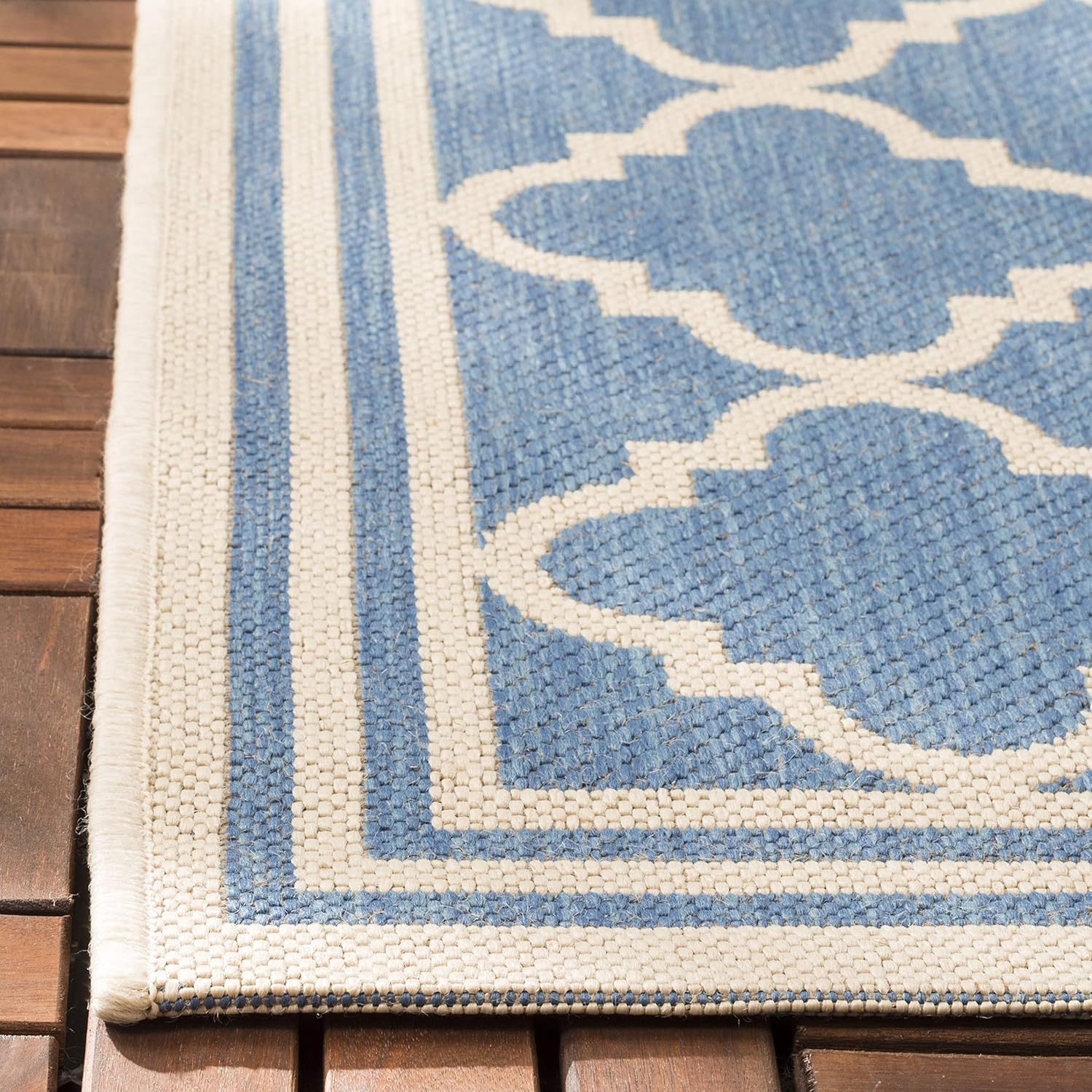 Blue and Cream Geometric 9' x 12' Synthetic Area Rug