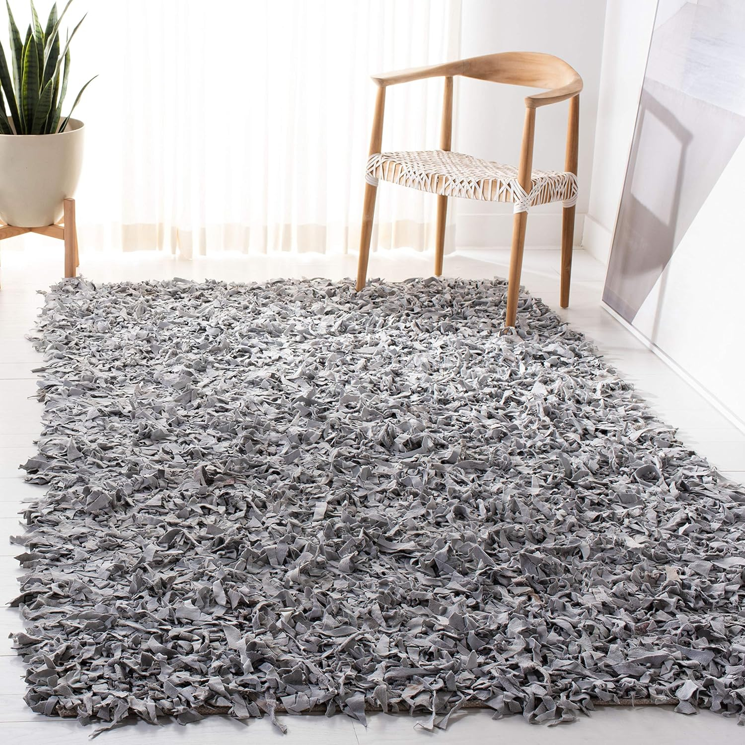 SAFAVIEH Mariam Leather Shag Area Rug, White, 2'3" x 4'