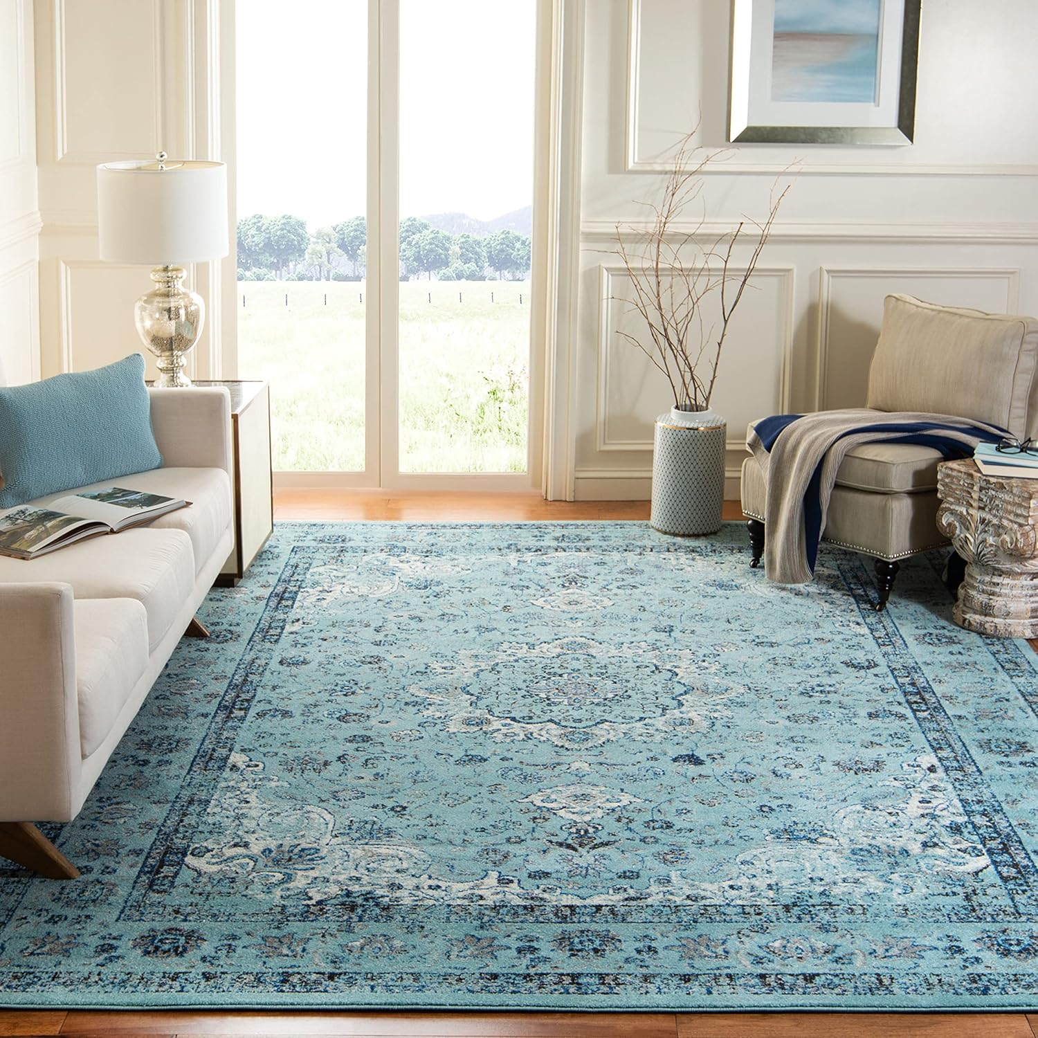 SAFAVIEH Evoke Teale Traditional Bordered Area Rug, Light Blue, 9' x 12'
