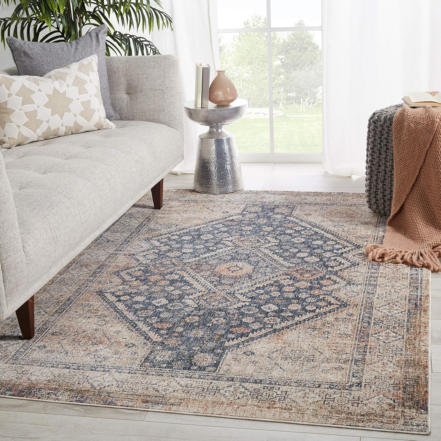 Blue and Taupe Synthetic Medallion 8' x 10' Area Rug