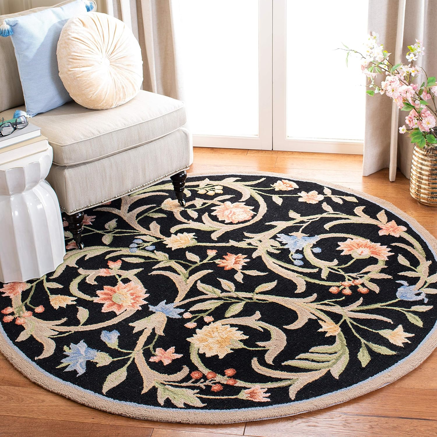 Handmade Round Floral Black and Ivory Wool Rug
