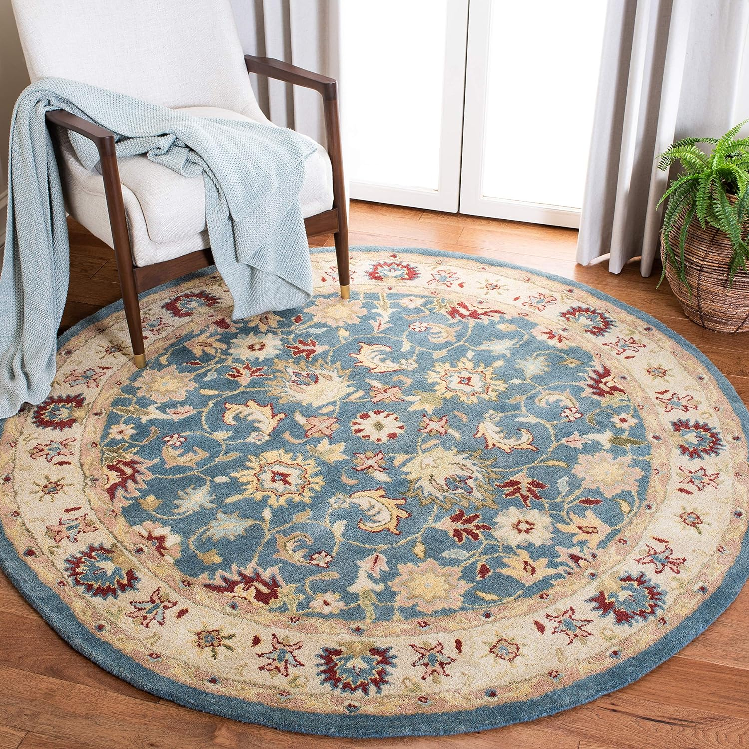 SAFAVIEH Antiquity Anderson Traditional Floral Wool Area Rug, Blue/Beige, 4'6" x 6'6" Oval