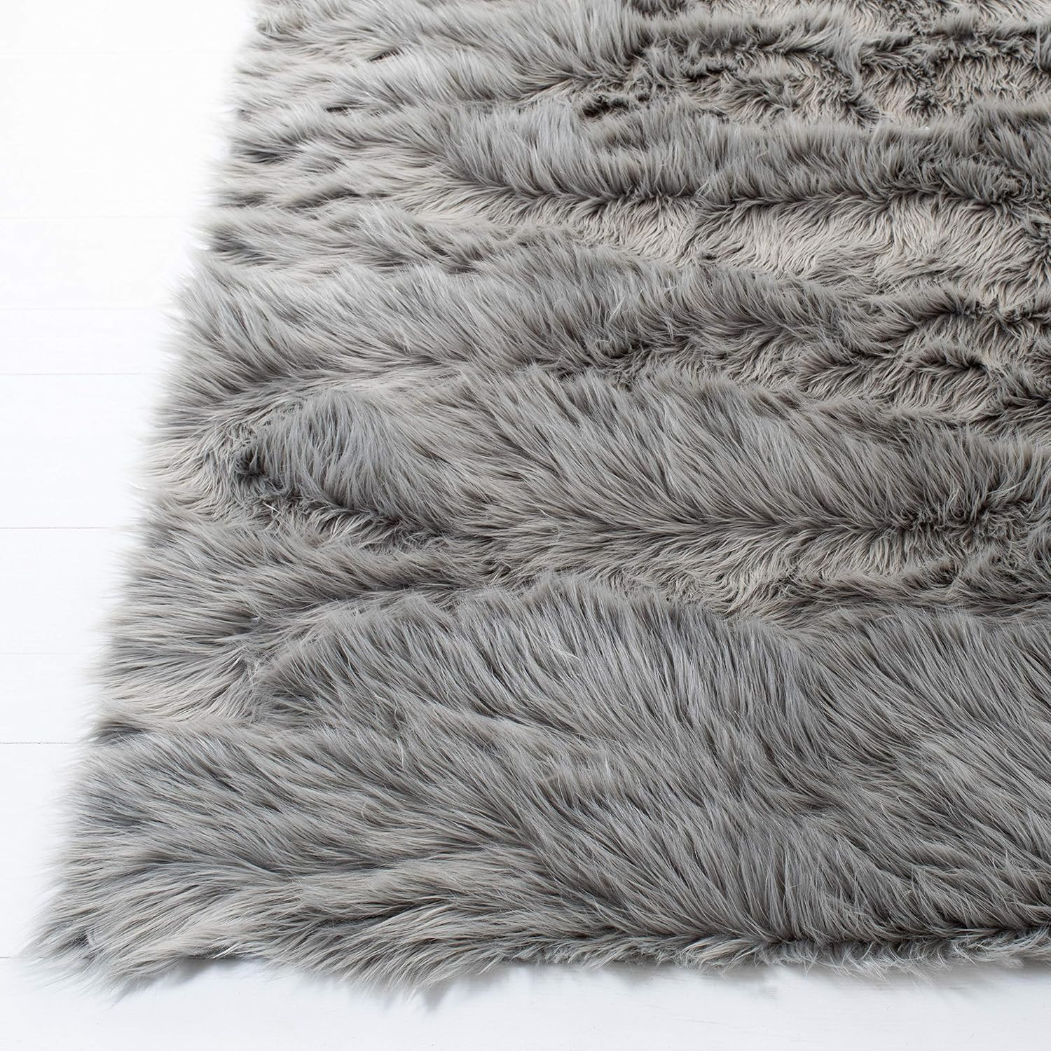 SAFAVIEH Faux Sheep Skin Vesna Solid Area Rug, Grey, 2' x 3'