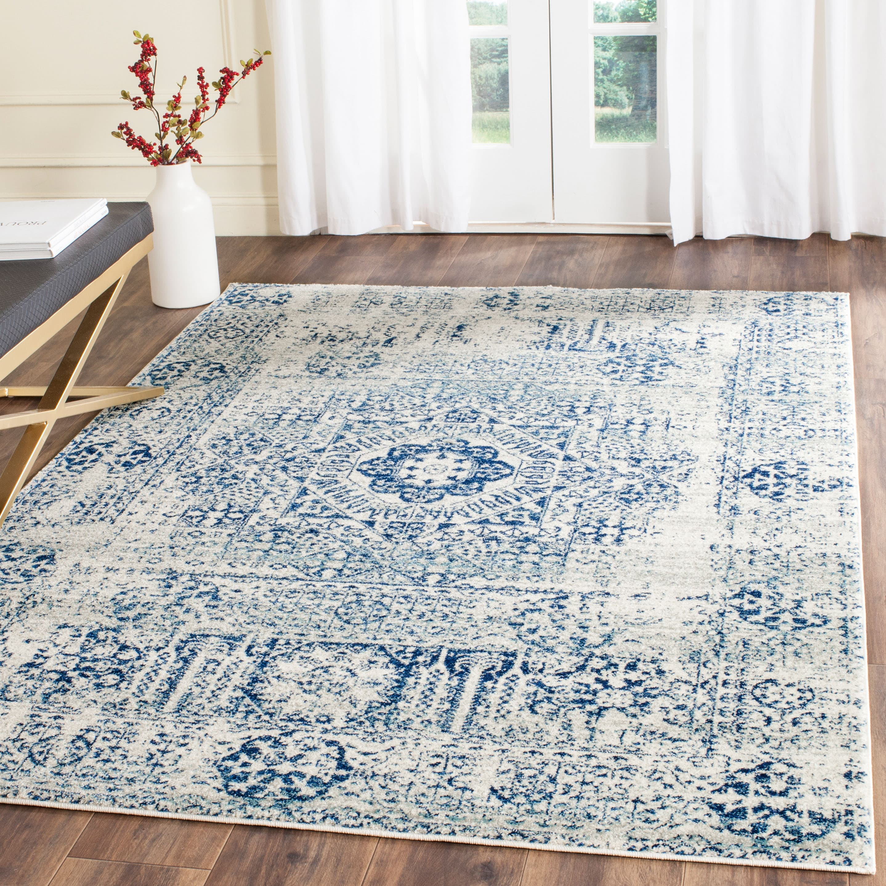 SAFAVIEH Evoke Collection Area Rug - 9' x 12', Ivory & Blue, Oriental Medallion Distressed Design, Non-Shedding & Easy Care, Ideal for High Traffic Areas in Living Room, Bedroom (EVK260C)