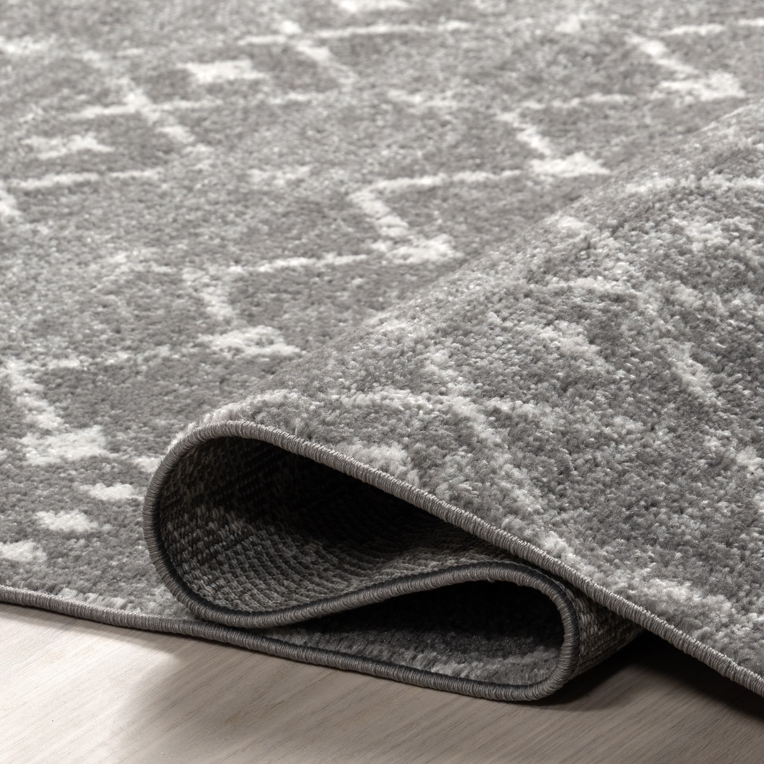 Handmade Dark Grey Geometric Oval 5' x 7' Synthetic Rug