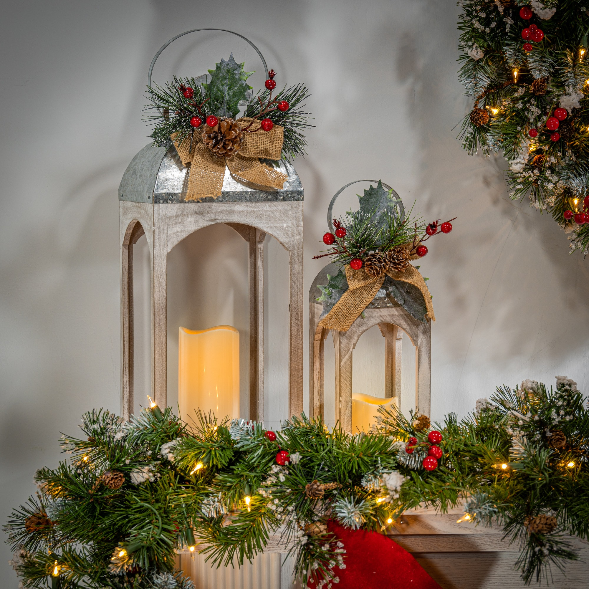 Gerson 2601420 Set of 2 Battery Operated Lighted Metal and Wood Holiday Lanterns with LED Candle and Floral Accent 18" H