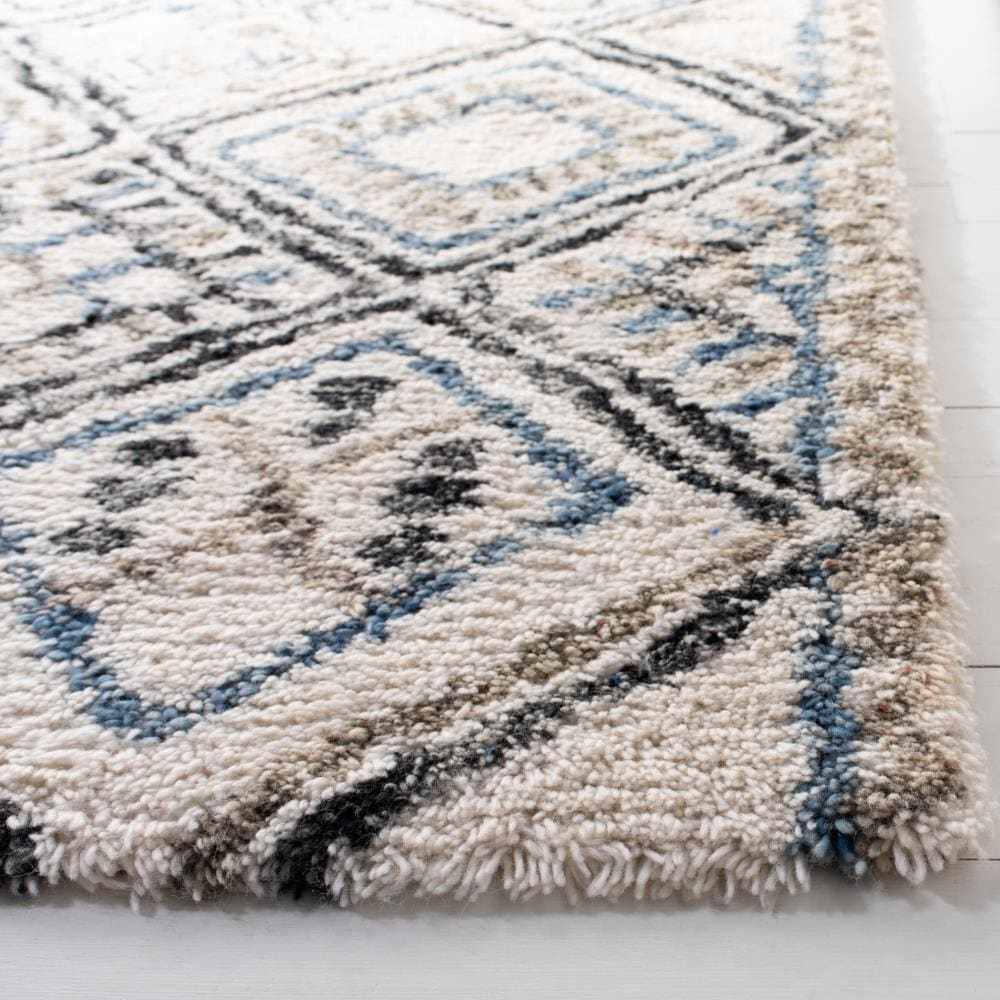 SAFAVIEH Casablanca Jake Geometric Moroccan Wool Shag Area Rug, Black/Ivory, 4' x 6'