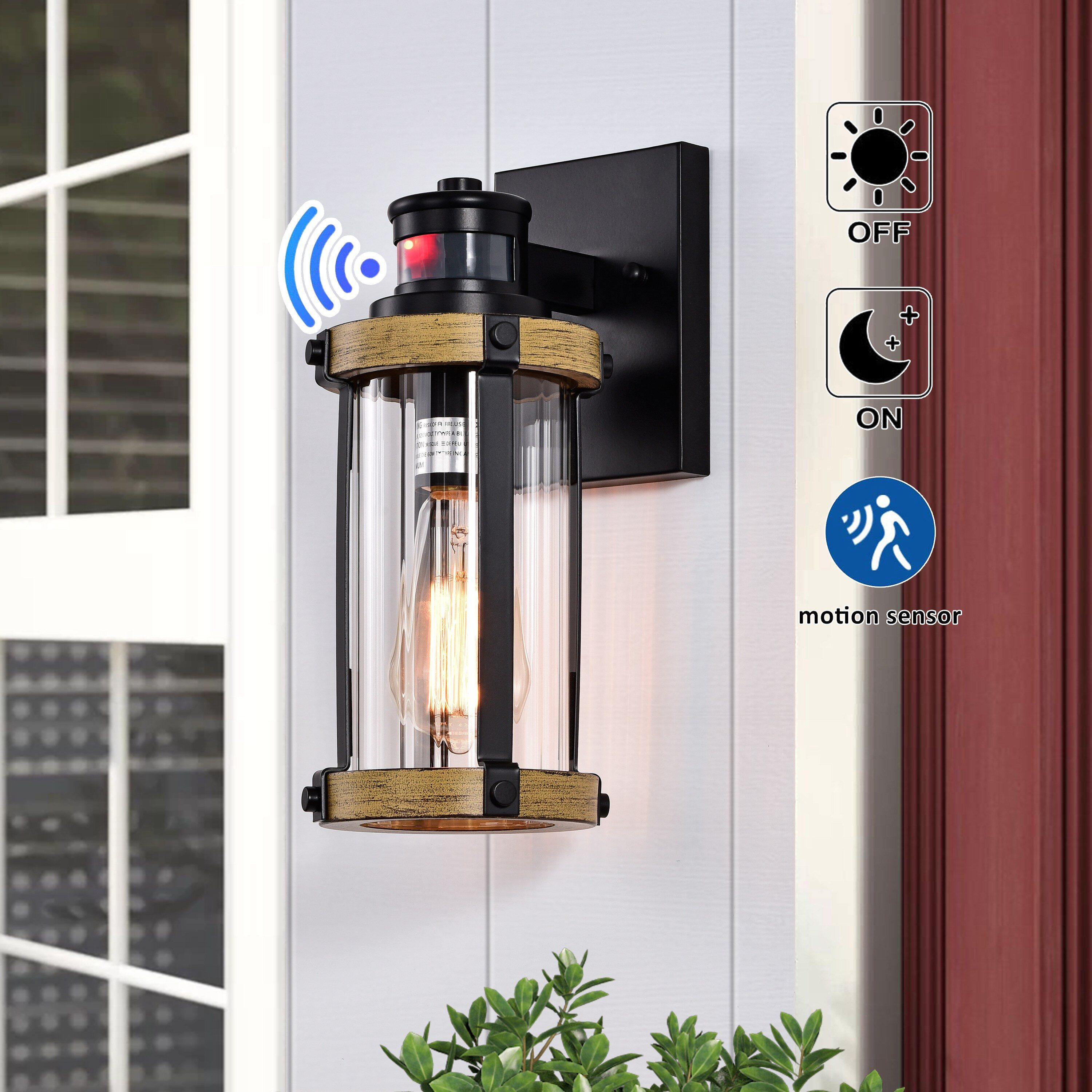 C Cattleya 5.5 in. 1-Light Motion Sensing Dusk to Dawn Outdoor Wall Sconce Black and Woodgrain Finish with Striped Clear Glass