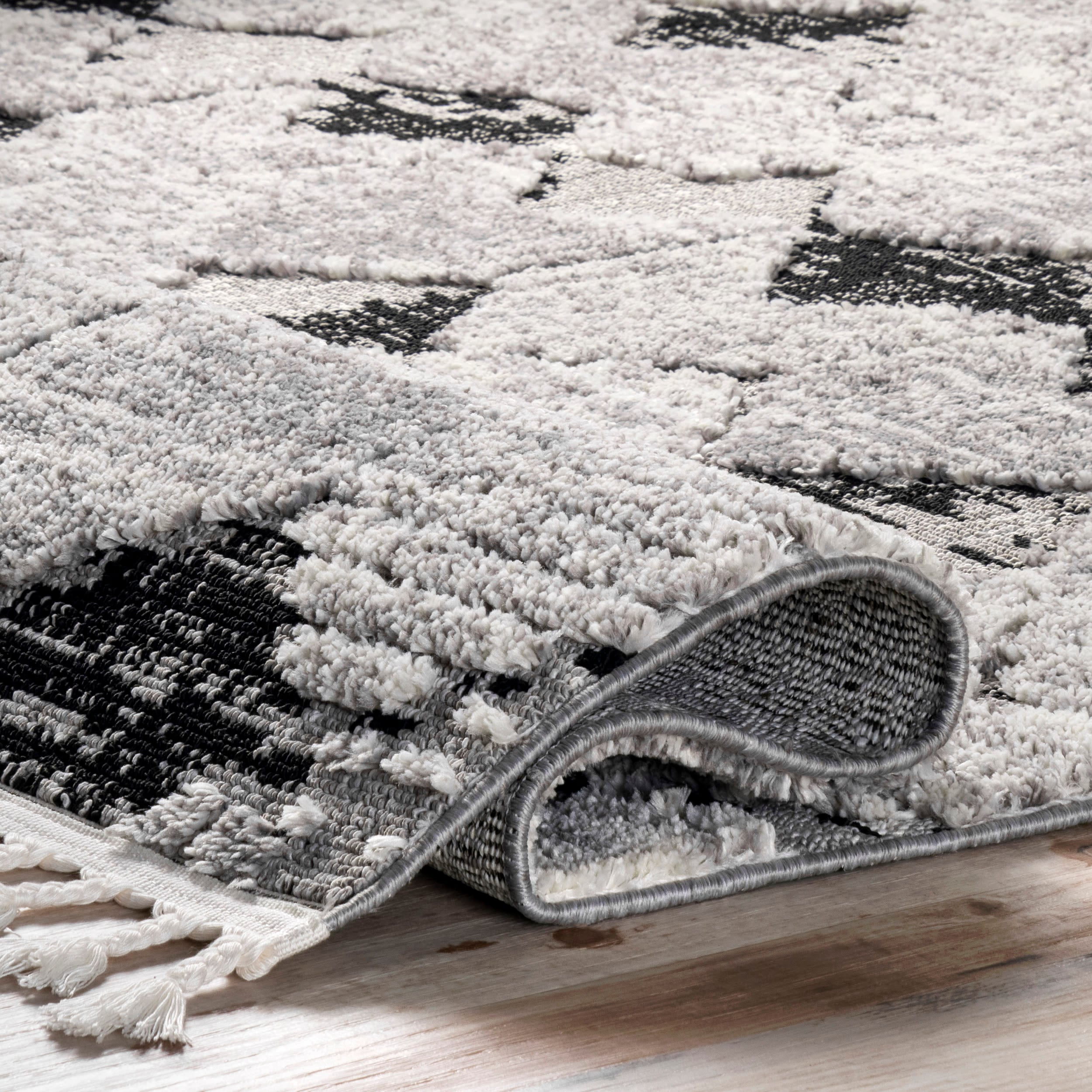 nuLOOM Agata Textured Tassel Area Rug, 5' 3" x 7' 7", Black