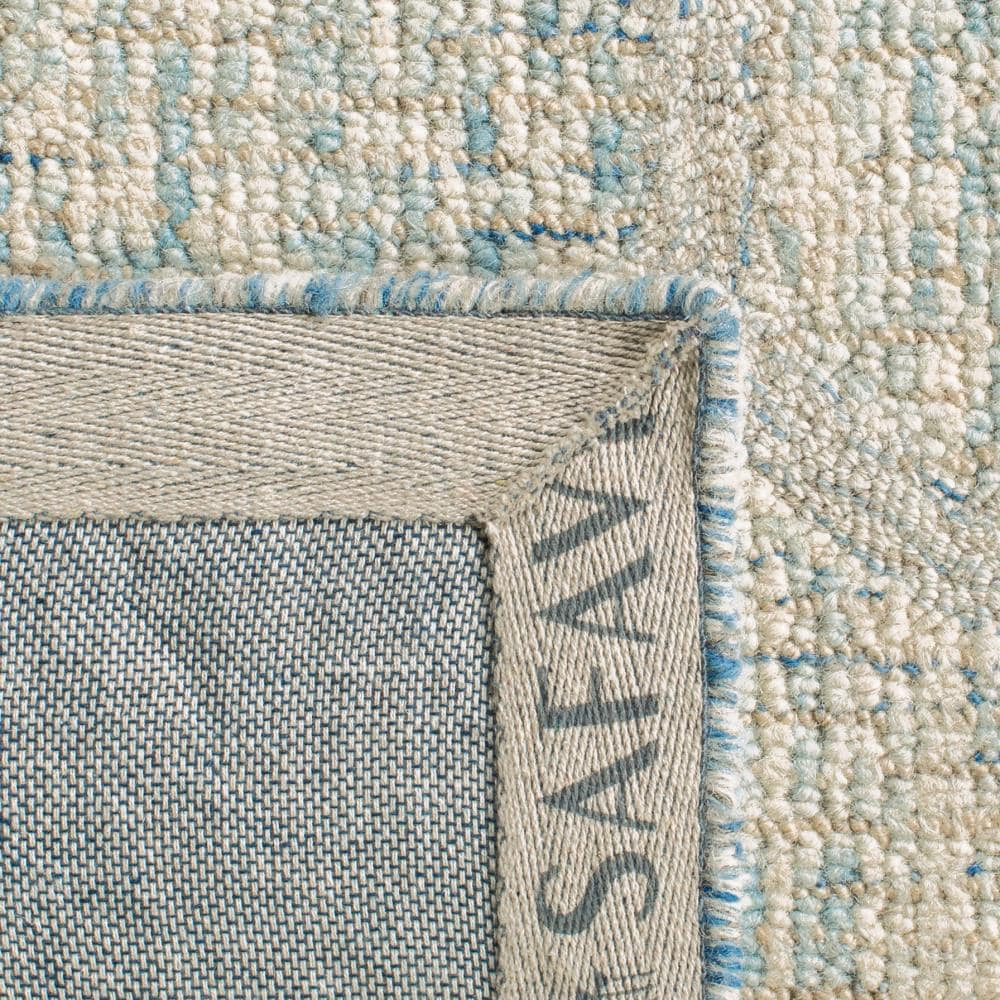 Ivory and Light Blue Tufted Wool Abstract 5 x 8 Rug