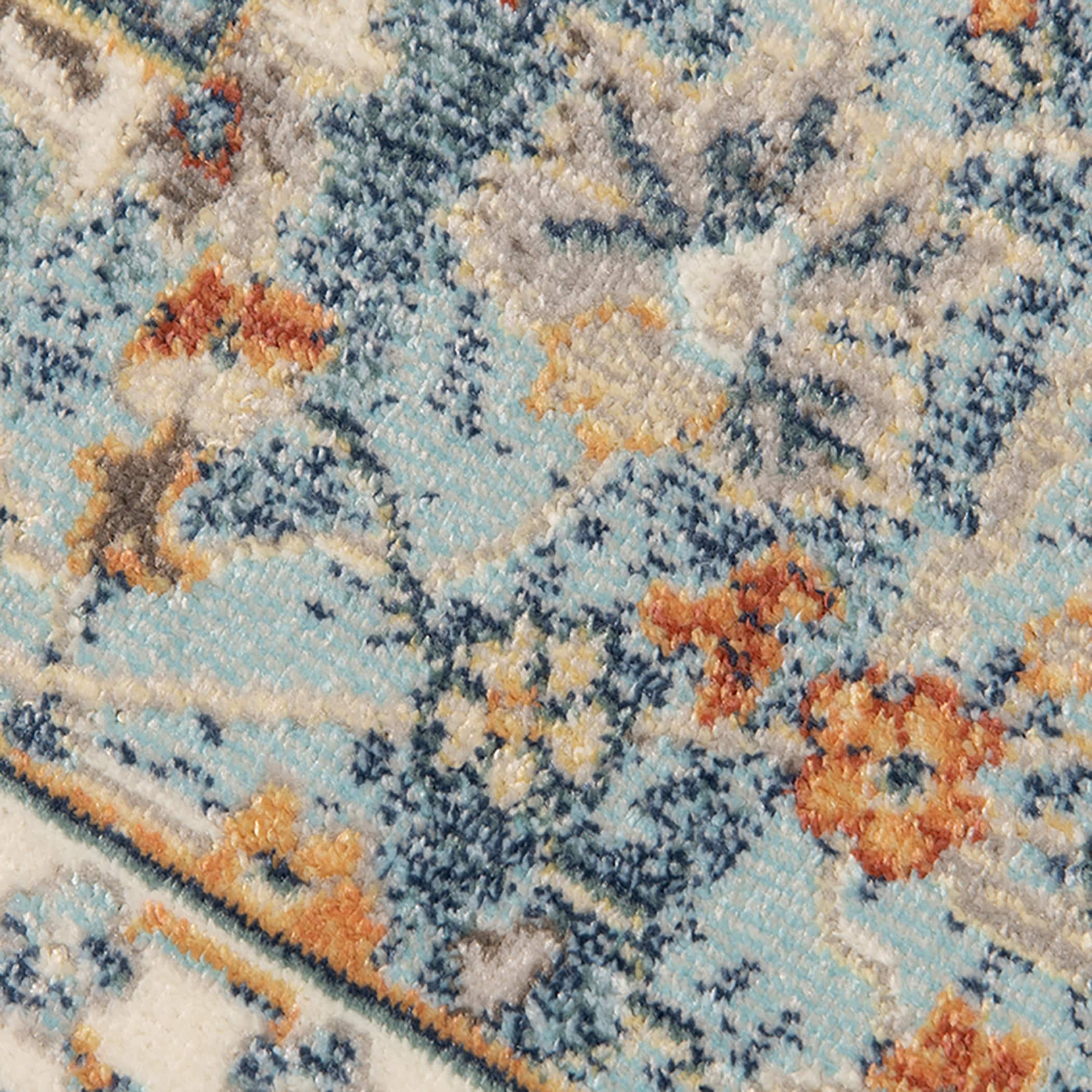 Bohemian Blue and Beige Synthetic 5' x 7' Area Rug