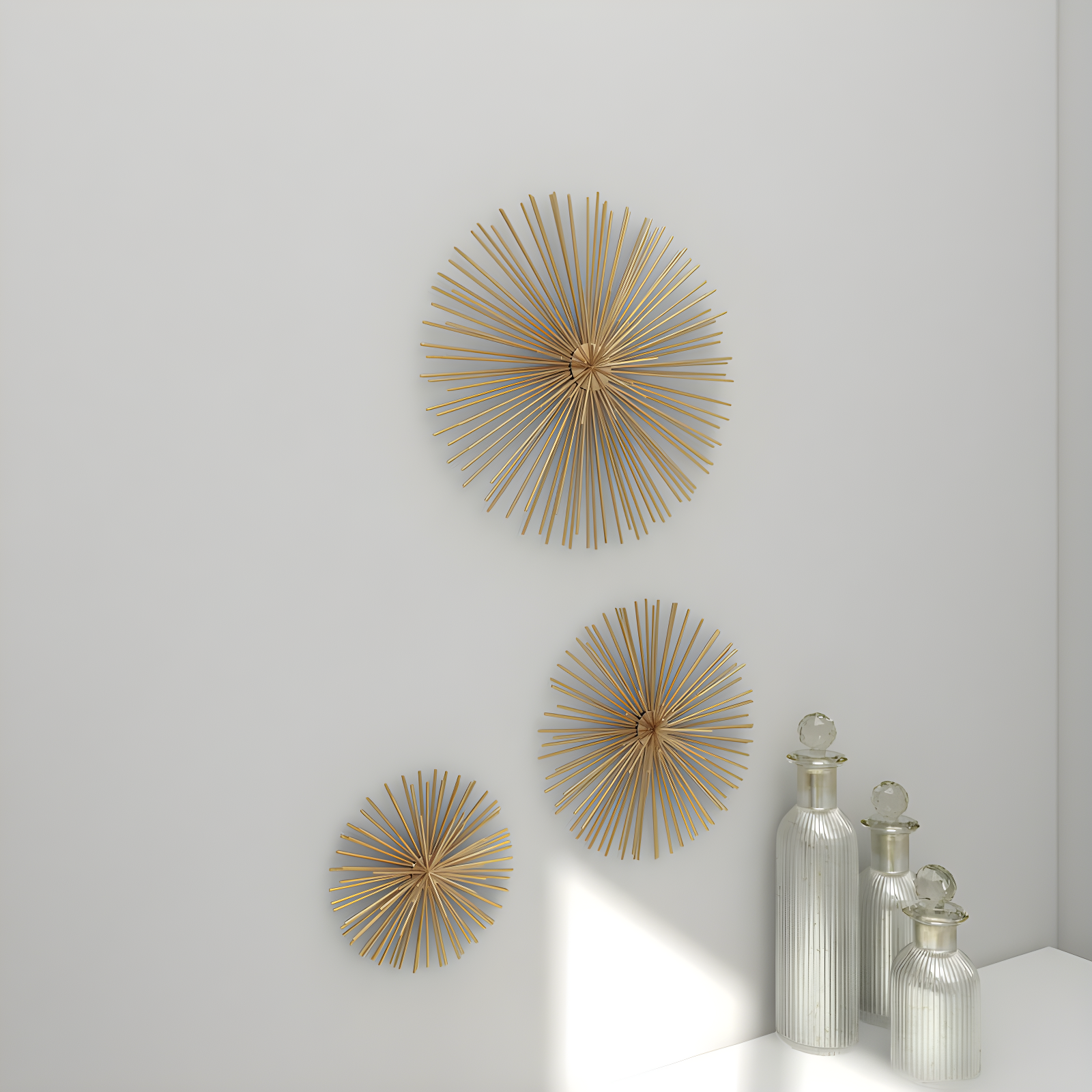 CosmoLiving by Cosmopolitan Gold Metal Starburst 3D Short Spike Home Wall Decor, Set of 3 6", 9", 12"W