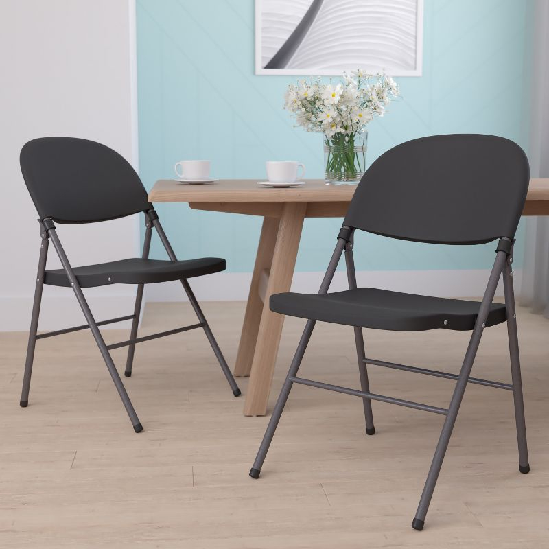 Flash Furniture 2 Pack HERCULES Series 330 lb. Capacity Black Plastic Folding Chair with Charcoal Frame
