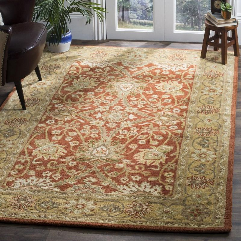 Antiquity AT249 Hand Tufted Area Rug - Rust/Gold - 5'x8' - Safavieh.