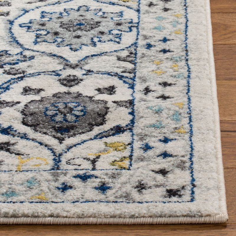Evoke EVK210 Power Loomed Area Rug - Ivory/Blue - 6'7"x9' - Safavieh.