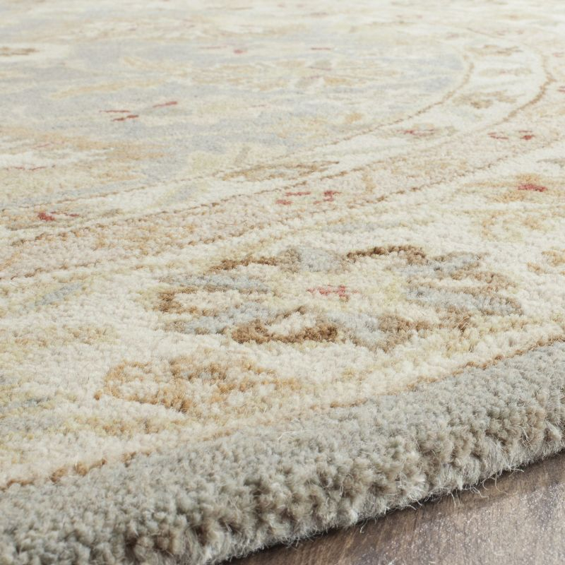 Antiquity AT822 Hand Tufted Area Rug - Grey Blue/Beige - 4'6"x6'6" Oval - Safavieh.