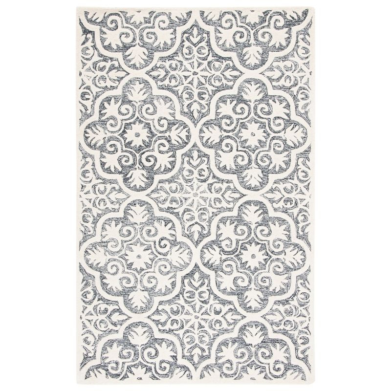 Metro MET859 Hand Tufted Indoor Area Rug - Black/Ivory - 8'x10' - Safavieh