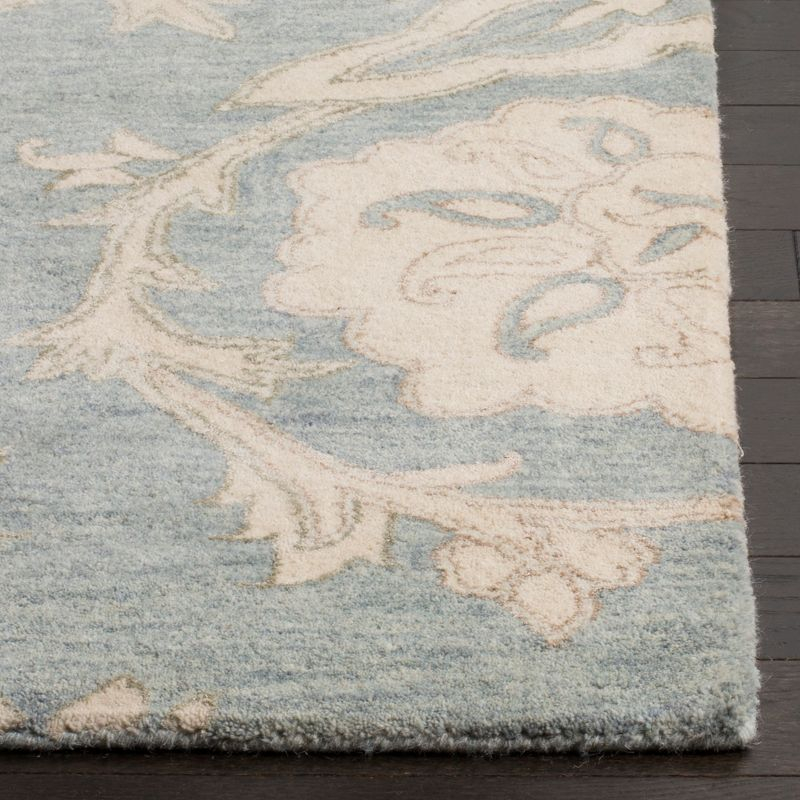Roslyn ROS901 Hand Tufted Indoor Area Rug - 5'x8' - Light Blue/Ivory - Safavieh