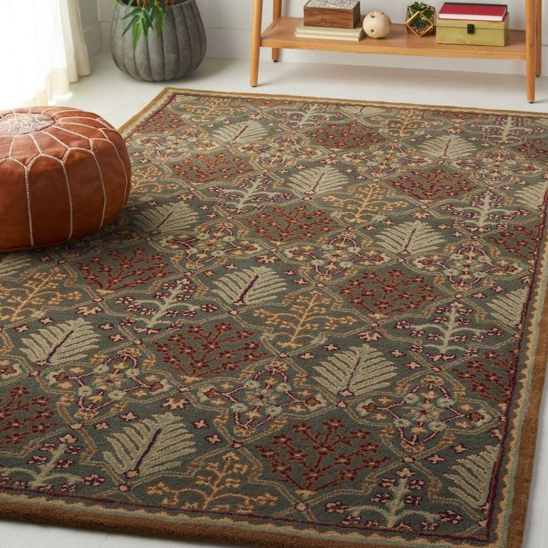 Antiquity AT613 Hand Tufted Area Rug - Light Blue/Gold - 6'x9' - Safavieh.