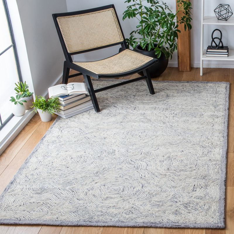 Ikat IKT506 Hand Tufted Area Rug - Silver - 9'x12' - Safavieh