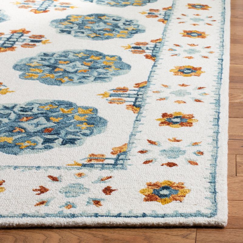 Blossom BLM901 Hand Tufted Area Rug - Blue/Ivory - 5'x8' - Safavieh.