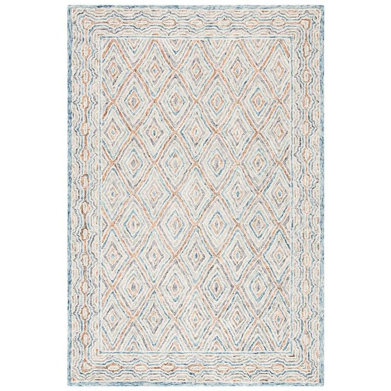 Capri CPR217 Hand Tufted Area Rug - Blue/Rust - 4'x6' - Safavieh.