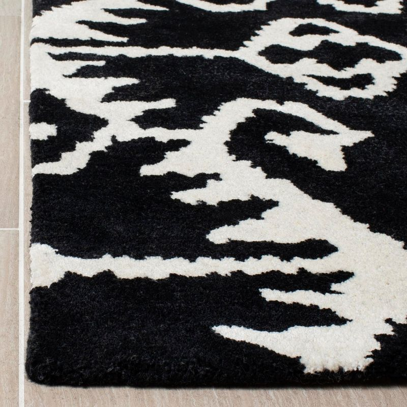 Wyndham WYD323 Hand Tufted Indoor Area Rug - Black/Ivory - 6'x9' - Safavieh.