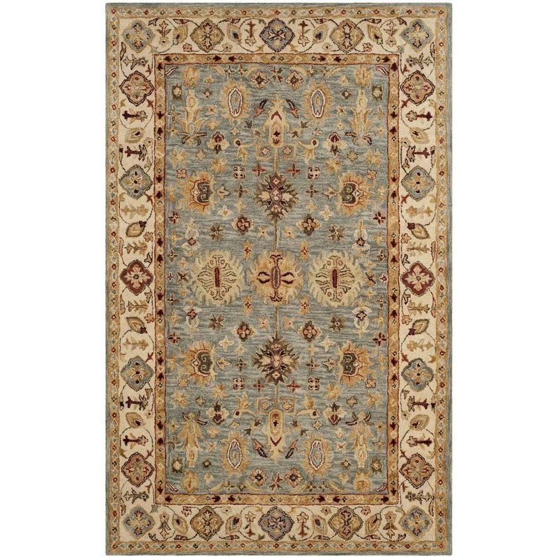 Antiquity AT847 Hand Tufted Area Rug - Blue/Ivory - 6'x9' - Safavieh.