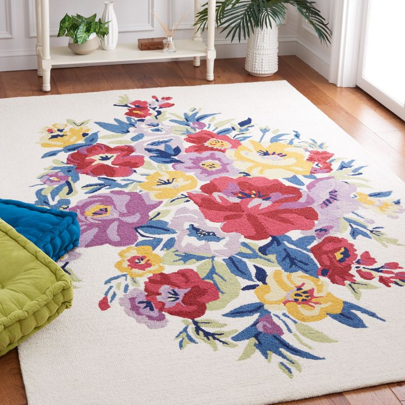 Chelsea HK219 Hand Tufted Area Rug - Ivory/Rose - 6'x9' - Safavieh.