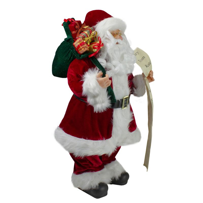 Northlight 24" Santa Claus with Bag of Gifts and Naughty or Nice List Christmas Figure
