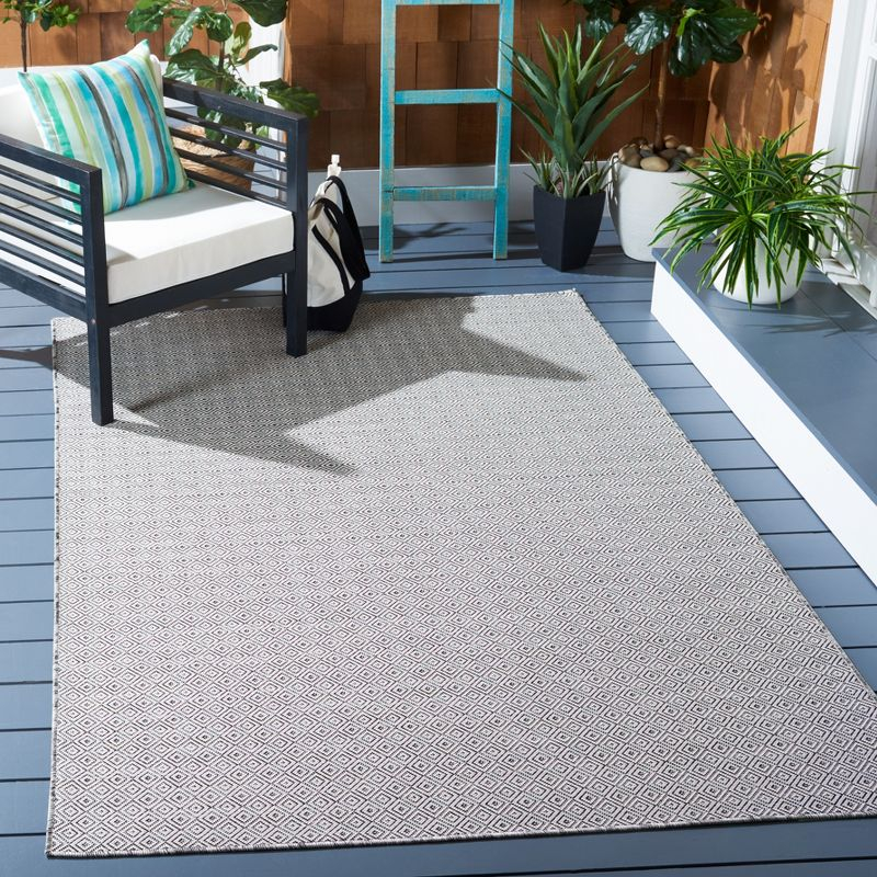 Hampton HTN230 Power Loomed Indoor/Outdoor Area Rug - Ivory/Black - 8'x10' - Safavieh.