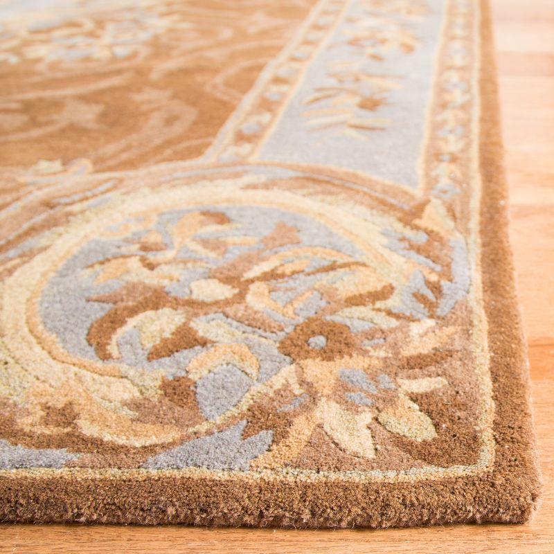 Empire EM409 Hand Tufted Wool Accent Rug - Blue/Brown- 2' X 3' - Safavieh.