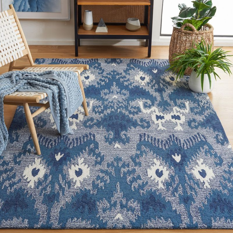 Ikat IKT652 Hand Tufted Area Rug - Blue/Ivory - 8'x10' - Safavieh.