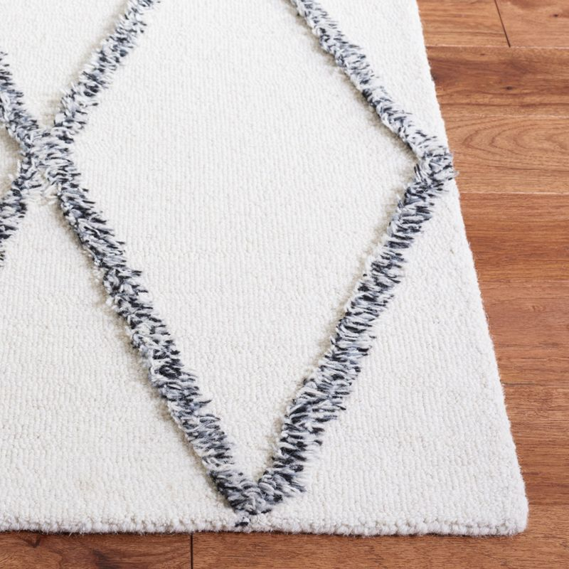 Casablanca CSB977 Hand Tufted Area Rug - Ivory/Black - 6'x9' - Safavieh.