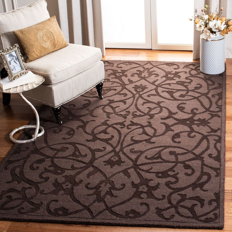 Impressions IM341 Hand Loomed Area Rug - Brown - 6'x9' - Safavieh.
