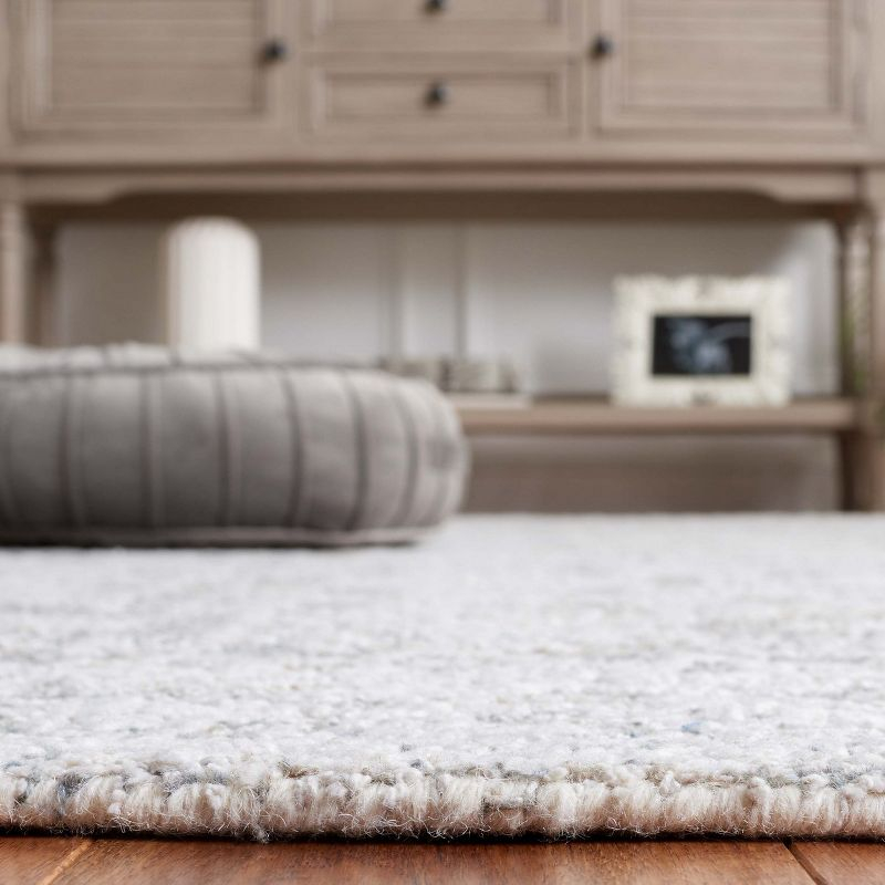 Ebony EBN201 Hand Tufted Area Rug - Grey/Ivory - 5'x8' - Safavieh.
