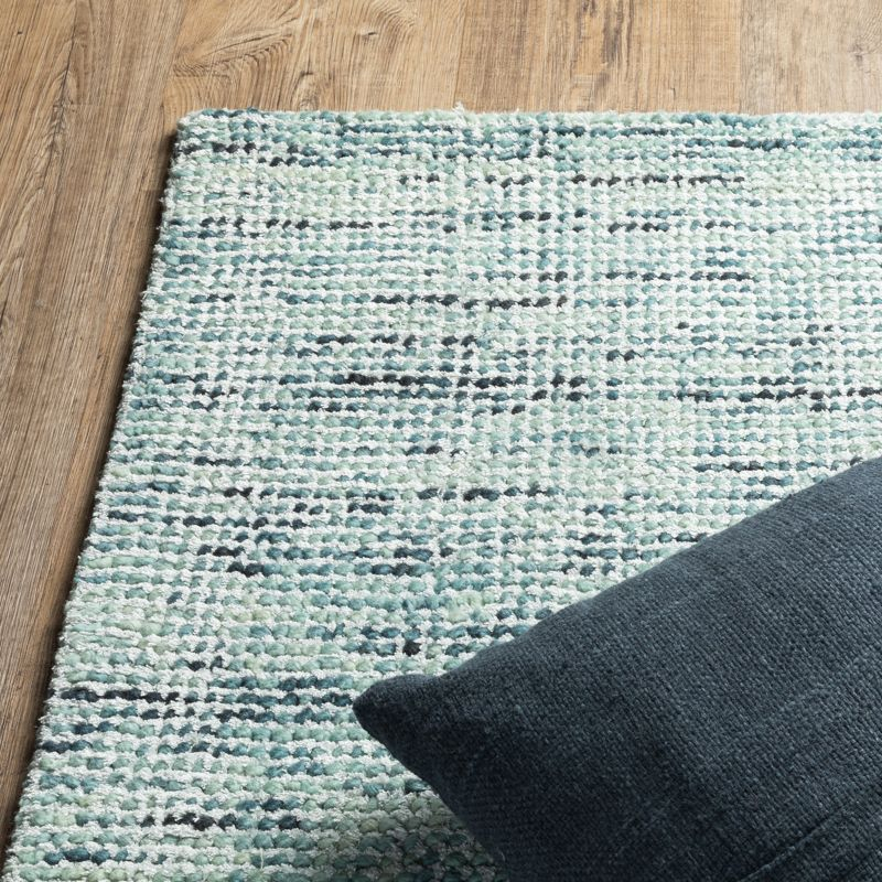 Lucent Handmade Tufted Blue/Teal Area Rug